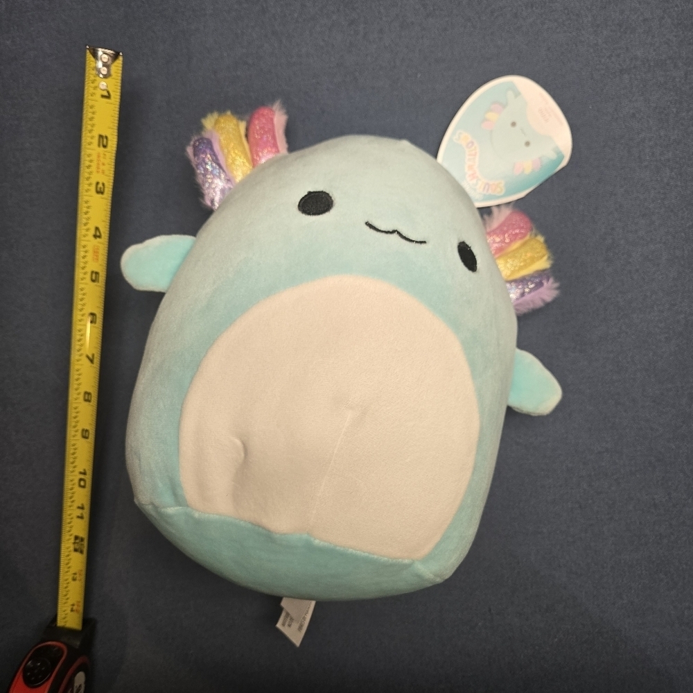 NWT Irina the 12" Axolotl a blue Squishmallow with purple yellow and pink gills.